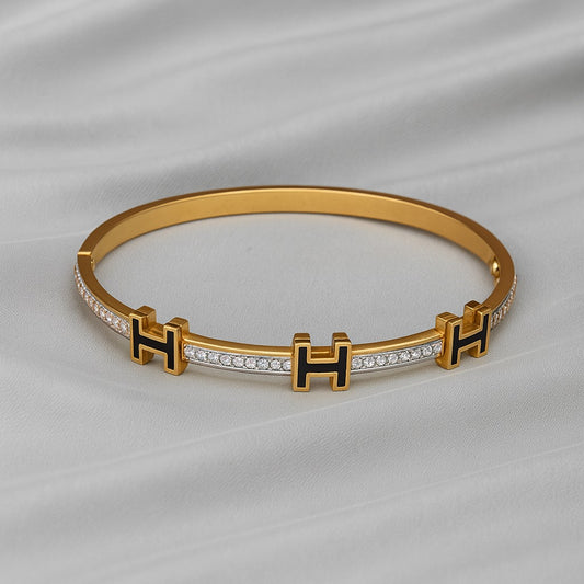 Luxury Gold-Plated “H” Designer Bangle with Black Enamel & Micro-Stone Detailing