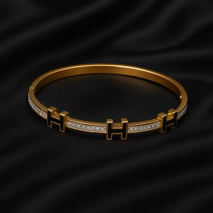 Luxury Gold-Plated “H” Designer Bangle with Black Enamel & Micro-Stone Detailing