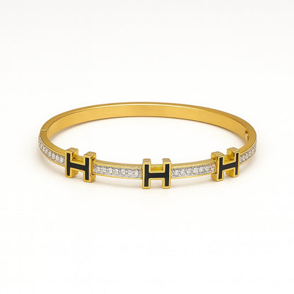 Luxury Gold-Plated “H” Designer Bangle with Black Enamel & Micro-Stone Detailing